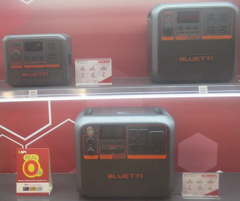 BLUETTI shop display with AC50P at upper left, AC180P upper right and AC200PL below